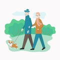 A couple of elderly people are walking with a pet. Corgi dog for a walk with the owners.