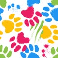 Seamless pattern with colorful animal paw prints. Royalty Free Stock Photo