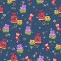 Christmas gifts on a blue background with snowflakes. Textile composition