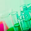 Science lab. Blue drop from a pipette in a science lab Stock Photo