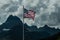 0000303_Old Glory, American Flag, waving over Swiftcurrent lake atGlacier National Park, Montana_2709