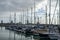 01/29/2020 Gosport, Hampshire, UK sailing boats docked in Gosport Marina, Hampshire With spinnaker tower in the background