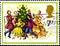 02 08 2020 Divnoe Stavropol Krai Russia postage stamp Great Britain 1978 Christmas Singing Carols people dance around the