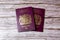 02-08-2021 Portsmouth, Hampshire, UK a pair Of British passports laid on a wooden table