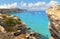 02.09.2018. people inside paradise clear torquoise blue water with boats and cloudy blue sky in background in Favignana island, Ca