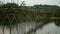 03 woman returns home after a day out to work on a bamboo bridge