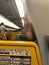 04/11/2019 - Ryanair flight from Warsaw in Poland to Amman in Jordan - Passenger resting his feet on the wall inside the aeroplane