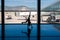 05/26/2019. Bodrum Airport / Milas Mugla Airport. Turkey. Small girl doing cartwheels exercise out of boredom while awaiting for h