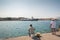 05/30/2018, Rhodes, Greece. Two fishermen at Akti Sachtouri sea promenade