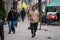 06-03-2020 Riga, Latvia Attractive man in trendy brown coat and coffe in his hand