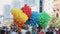 06.25.2022 Warsaw, Poland. Rainbow colors made out of red, green, yellow, violet, blue, and orange balloons held by