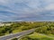 06/28/2019 Galway, Ireland N6 Road, Galway Cathedral and shops. Aerial view, Cloudy sky, Early morning, light traffic