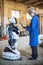 06 april 2019 Russia Novosibirsk: The man assembles a human-like robot and mends his hand