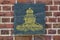 08-24-2021 Portsmouth, Hampshire, UK, The Emblem or crest of the Royal Artillery on a plaque on a brick wall