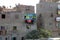 09.21.2015. Egypt, Cairo, Dirty unfinished house. And a brightly painted balcony with linens