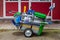 09/29/2020 Portsmouth, Hampshire, UK A cleaners trolley with cleaning equipment outside a block of flats