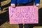 1-18-2020 Tulsa USA Cropped person with tattooed hands holds pink sign at political rally - Not usually a sign guy but GEEZ