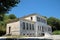 1-6-2021 , stone traditional building . Primary school. Tsagarada, Greece.