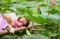 1.	Beautiful Asian lady has a daydream near the lotus pond in blooming season