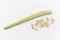 1 head of lemongrass and finely chopped lemongrass on a white background