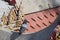 1 pigeon perched on the roof of an outdoor temple, selectable focus