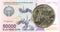 1 Uzbek Som coin against 50000 Uzbek Som banknote