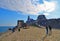 10.04.2017. San Pietro church, Lord Byron Natural park with people in Portovenere village on stone cliff rock and blue sky, view f