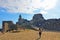 10.04.2017. San Pietro church, Lord Byron Natural park with people in Portovenere village on stone cliff rock and blue sky, view f