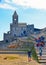 10.04.2017. San Pietro church, Lord Byron Natural park with people in Portovenere village on stone cliff rock and blue sky, view f