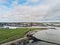 10/04/2019 Galway city, Ireland.Aerial view, Port and South park, low tide, Cloudy sky