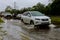 10 SEPTEMBER 2018 NJ USA: Car driving through flood water the road during monsoon season