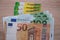 100, 50 euro banknotes, German public health insurance cheaper, electronic insurance card, concept medical support in country and