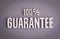 100% Guarantee sign lettering on solid background