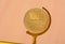 100 Percent Satisfaction Gold Seal on wooden background