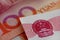 100 Yuan banknotes seen on the macro images. Concept for economy, finance and digital Yuan. Selctive focus