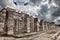 1000 pillars complex at Chichen Itza site against the storm sky
