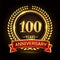 100th golden anniversary logo, with shiny ring and red ribbon, laurel wreath isolated on black background, vector design