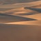 1060 Desert Sand Dunes: A serene and picturesque background featuring desert sand dunes in warm and sandy colors that create a t