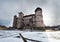 107/5000 Renaissance castle in Nowy WiÅ›nicz in winter scenery