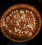 108 diya burning on the big golden plate in maha sandhi puja of goddess durga