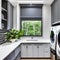 11 A laundry room with a mix of white and gray finishes, a large, graphic tile backsplash, and a mix of open and closed storage4