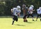 11U youth football runner