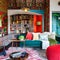 12 A eclectic living room with mismatched furniture, bold patterns, and bright colors5, Generative AI