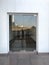 12 millimeters thick toughened Glass door with Stainless steel made tube glass Doors and its floor and lintel mounted Doors which
