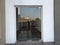 12 millimeters thick toughened Glass door with Stainless steel made tube glass Doors and its floor and lintel mounted Doors which