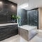 12 A modern, luxurious bathroom with a mix of marble and glass finishes, a large, freestanding bathtub, and a mix of open and cl