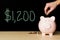 $1200 COVID-19 Stimulus Piggybank