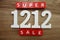 1212 Super Sale alphabet letters on wooden background