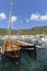 12th century coastal town lying on the island of Vis on the Adriatic Sea, view on port, moored sailboats, Komiza, Vis Island, Croa