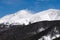 13,391 Foot Parry Peak and 13,130 Foot Eva Peak rise above Winter Park, Colorado.